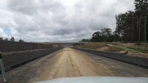 Nambucca-Bridge-96-dpi-5 - Conplant Pty Ltd A dirt road under construction showcases constraint defined capability beneath a cloudy sky.